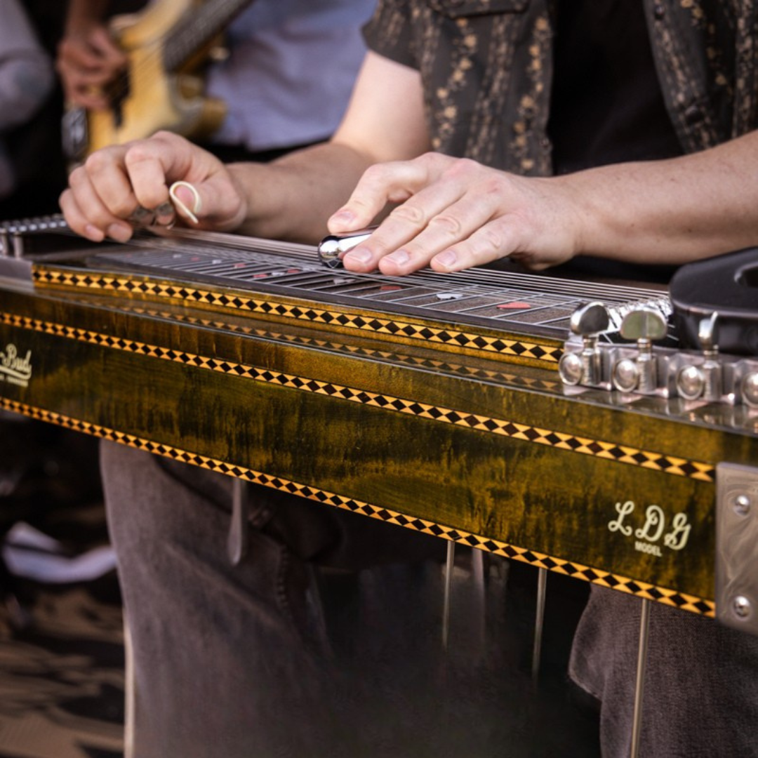 Close-up of a pedal steel guitar being played