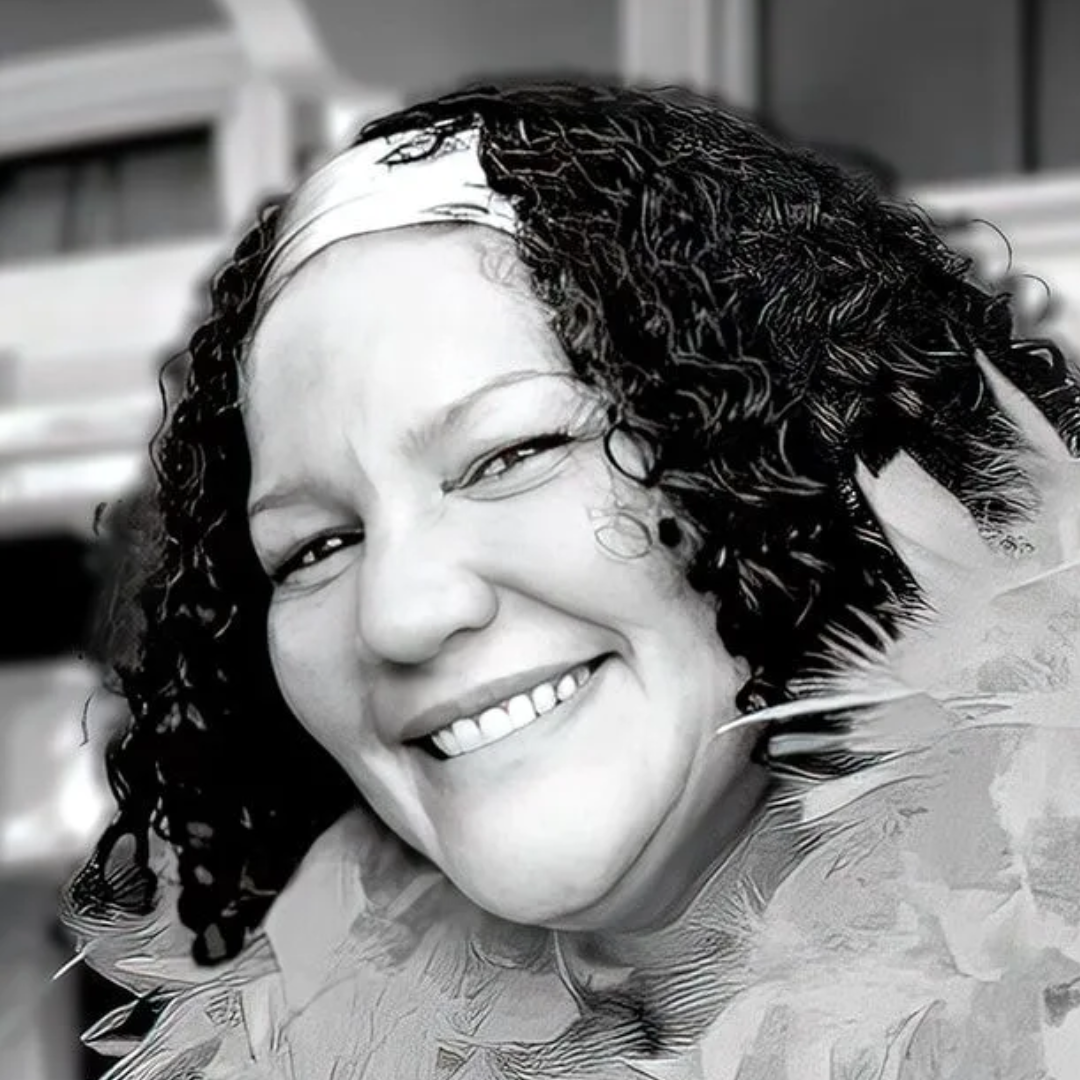 Black and white portrait of a smiling vocalist